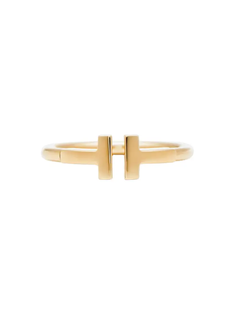 A gold ring on a plain background: the photo you upload