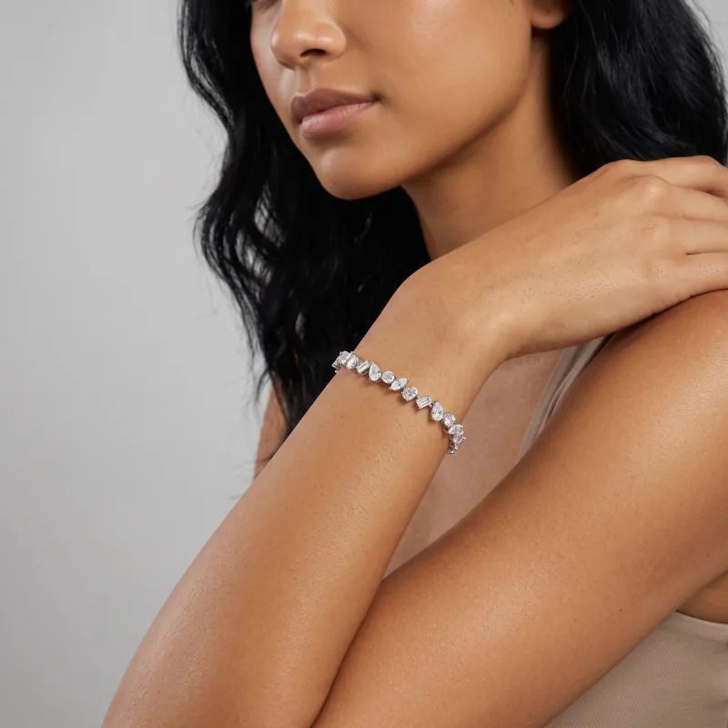 The tennis bracelet worn on a raised wrist, generated