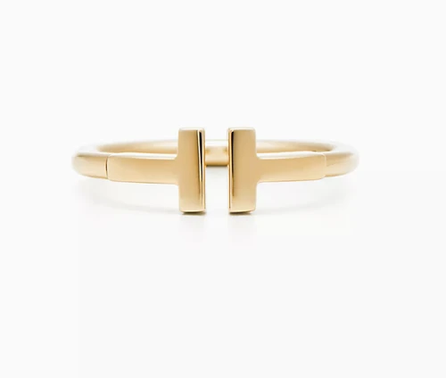 A plain product photo of a gold ring on white, as uploaded